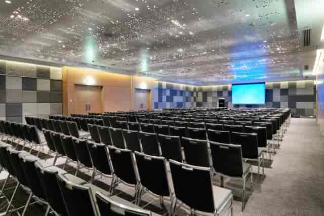 Modern Grand Ballroom with fiber-optic ceiling, ideal for corporate presentations and conferences.