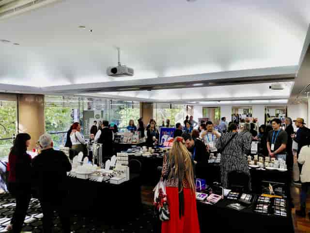 Trade show booths at Gold Coast Convention Centre, bright exhibition space for corporate events.