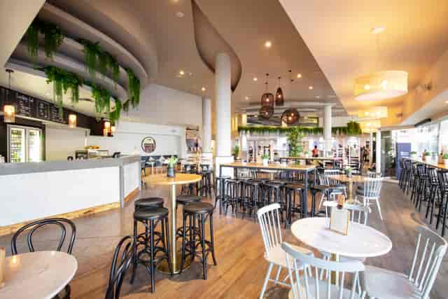 Modern Surfers Room meeting space for networking events and corporate mixers.