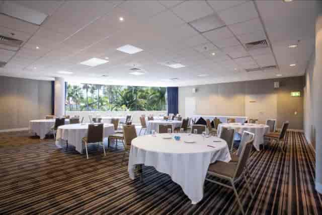 Currumbin Room banquet space with floor-to-ceiling windows for social events and conferences.