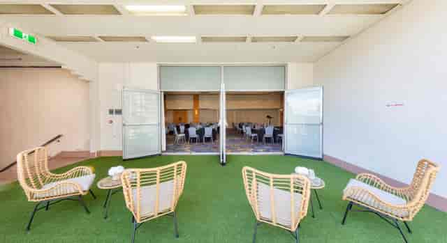 Currumbin Room at Novotel Surfers Paradise: airy terrace breakout space for corporate events.