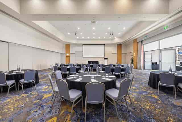 Burleigh Room hotel ballroom with banquet seating for corporate events and gala dinners.