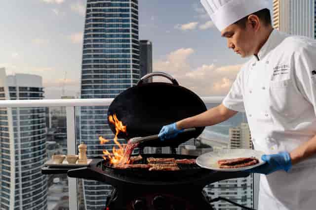 Kirra Room rooftop catering with urban skyline backdrop for corporate events and private parties.