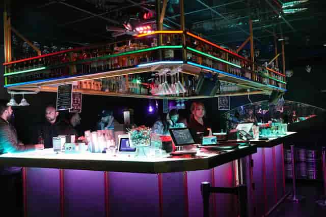 Illuminated bar at The Mean Fiddler, ideal for corporate networking and conference receptions.