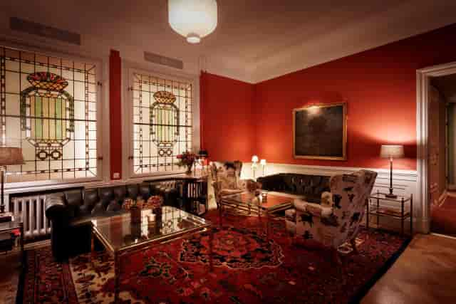 Luxury hotel lounge with heritage architecture, ideal for executive meetings and VIP networking.