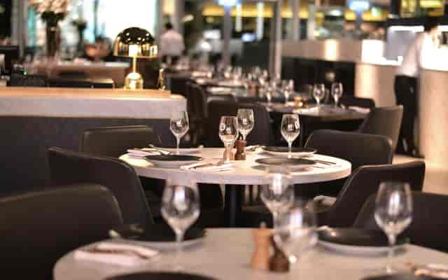 Upscale Manhattan Grill restaurant setup for corporate dinners and VIP reception events.