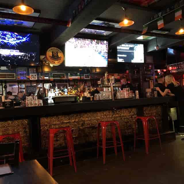 The Mean Fiddler main bar with high-top seating for networking events and corporate receptions.