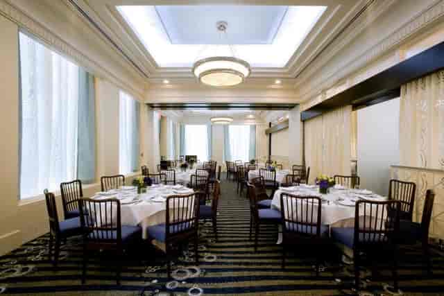 Salon North banquet room with high ceilings for corporate luncheons and wedding receptions.