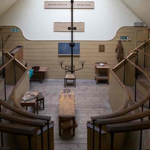 Historic auditorium at Old Operating Theatre, tiered seating for workshops and keynotes.