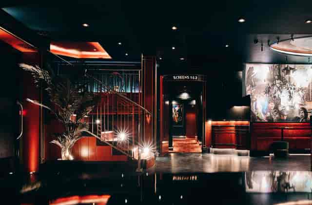 Picturehouse Central: Atmospheric mezzanine and staircase for film-themed corporate gala receptions.