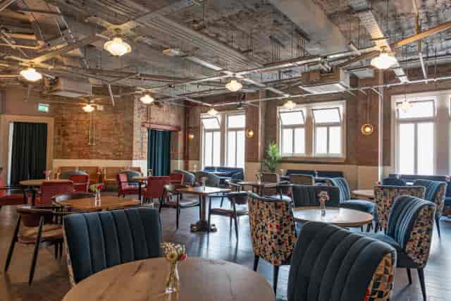 Industrial-chic Picturehouse Central venue with natural light for networking and workshops.
