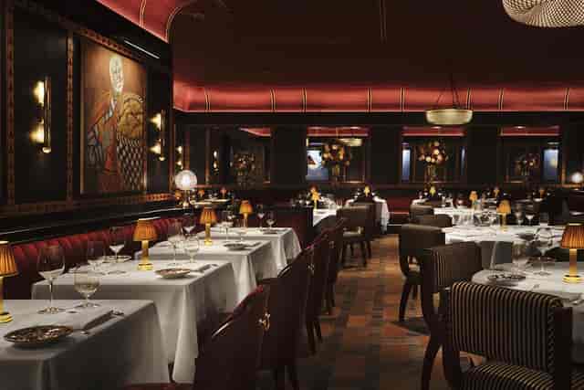 Manhattan Grill private dining room with plush seating for upscale corporate executive dinners.