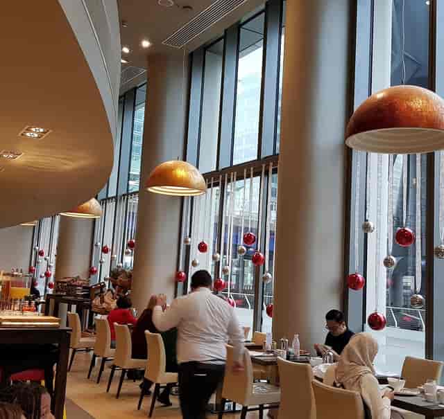 Manhattan Grill venue with floor-to-ceiling windows for corporate events and networking lunches.
