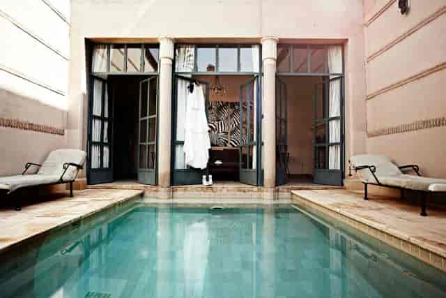 Boutique riad courtyard in Wild Notting Hill for intimate executive retreats and bridal suites.