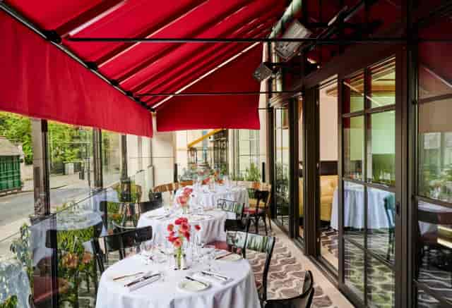 Covered outdoor venue in Notting Hill for corporate luncheons and small-group receptions.