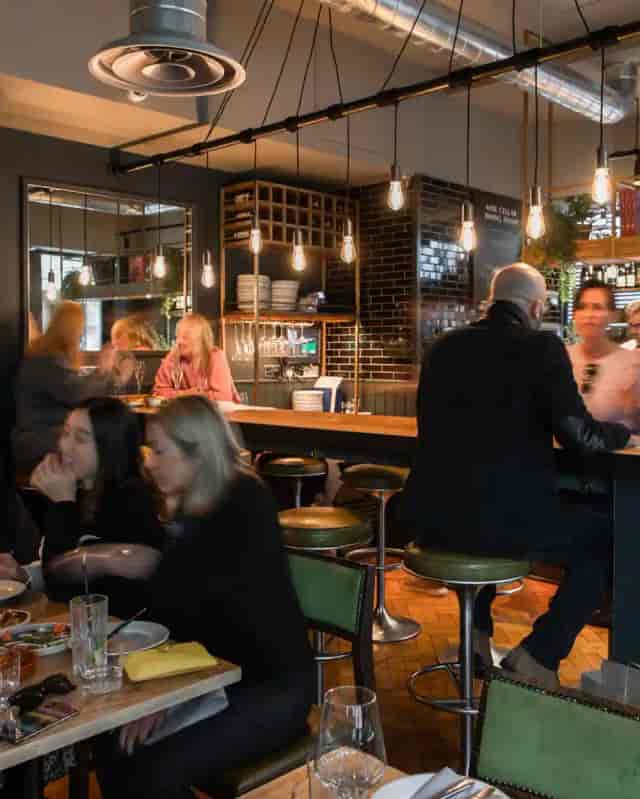 Intimate Dehesa wine cellar venue with warm lighting for upscale networking and team events.