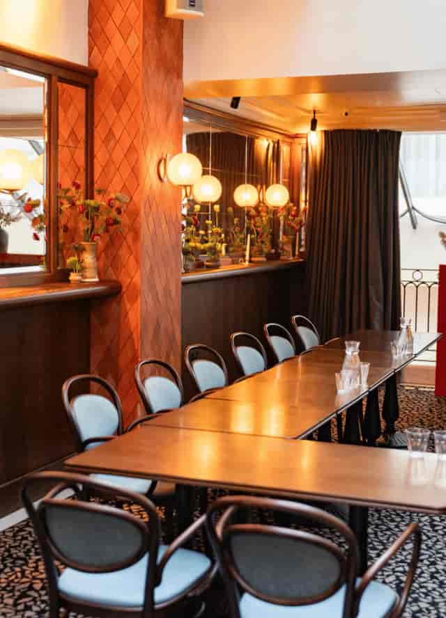 Henri Restaurant boardroom: wood-paneled intimate space for corporate meetings and event hire.