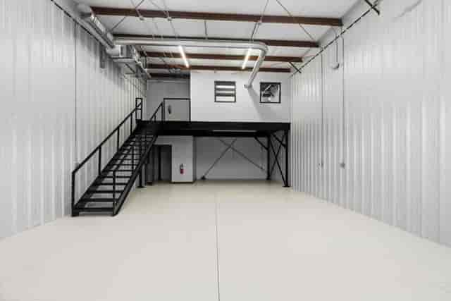 Industrial event space at The Mezzanine, Henrietta Experimental, with high ceilings for pop-ups.