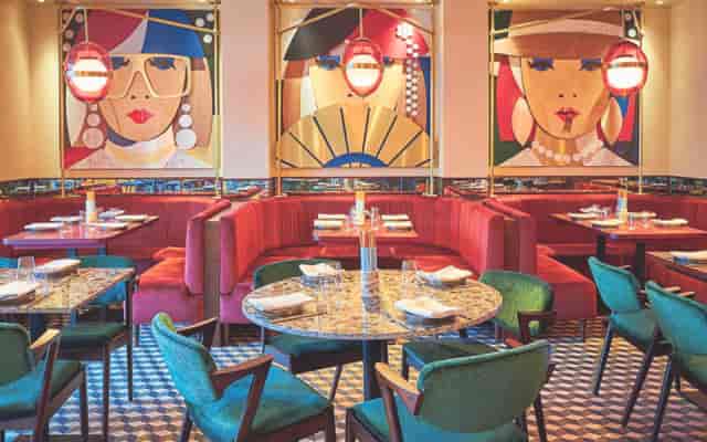Chef's Table at Henrietta Experimental: bold art-filled breakout space for private networking dining.