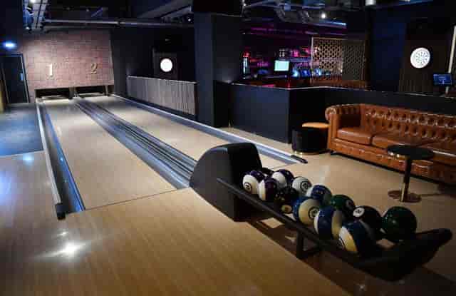 Spinners Reading corporate event venue with bowling, darts, and lounge seating for team building.