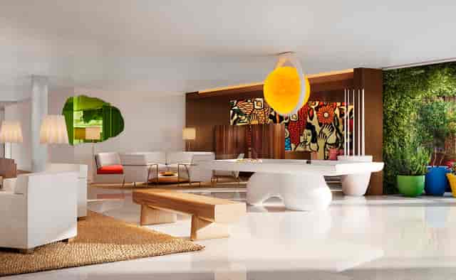 Modern rooftop lounge with billiards table for upscale corporate networking and event hosting.