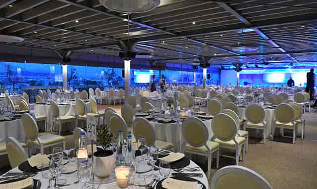 LOFT 26 banquet venue with modern seating and sunset views for corporate events and gala dinners.
