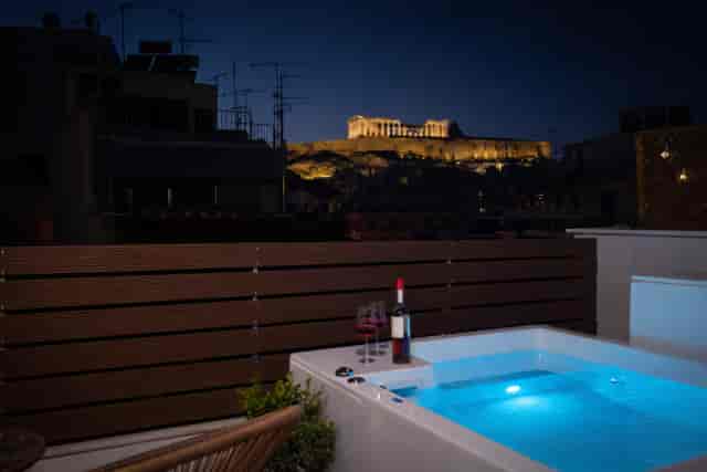 VIP event at LOFT 26 with illuminated Acropolis view for luxury corporate incentive venue.