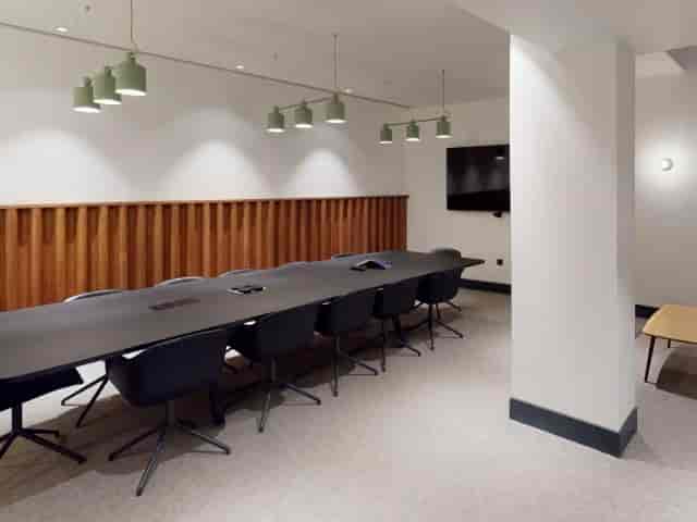 Boardroom-style Green Room at The Griffin for executive meetings and professional workshops.
