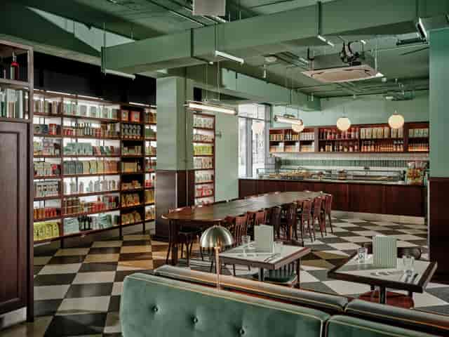 Lina Stores Manchester communal dining table, perfect for boutique networking and board dinners.
