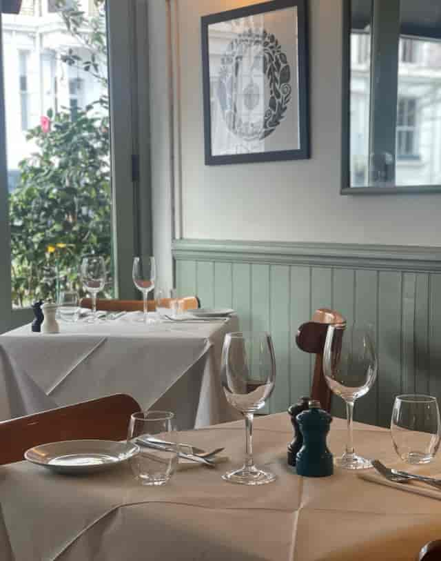 Intimate VIP breakout venue at Six Portland Road with elegant table settings for professional events.