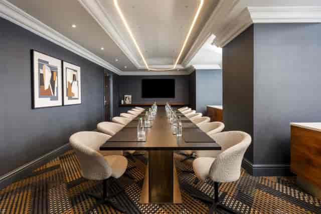 Belgravia Suite boardroom for executive meetings and corporate strategy sessions.