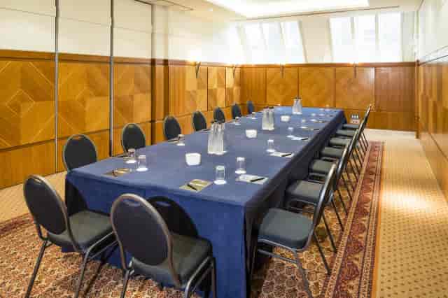 Brompton Room boardroom, wood-paneled, intimate meeting space, corporate event venue London.