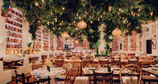 Circolino private dining room with maximalist shelves for incentive dinners and event buyouts.