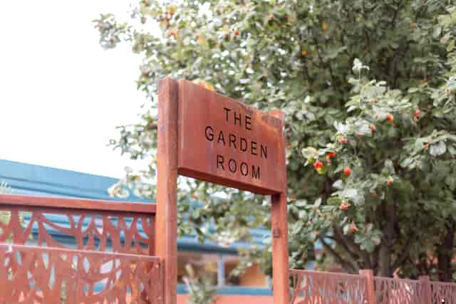 The Garden Room at The Biscuit Factory: rustic signage for outdoor networking and cocktail events.