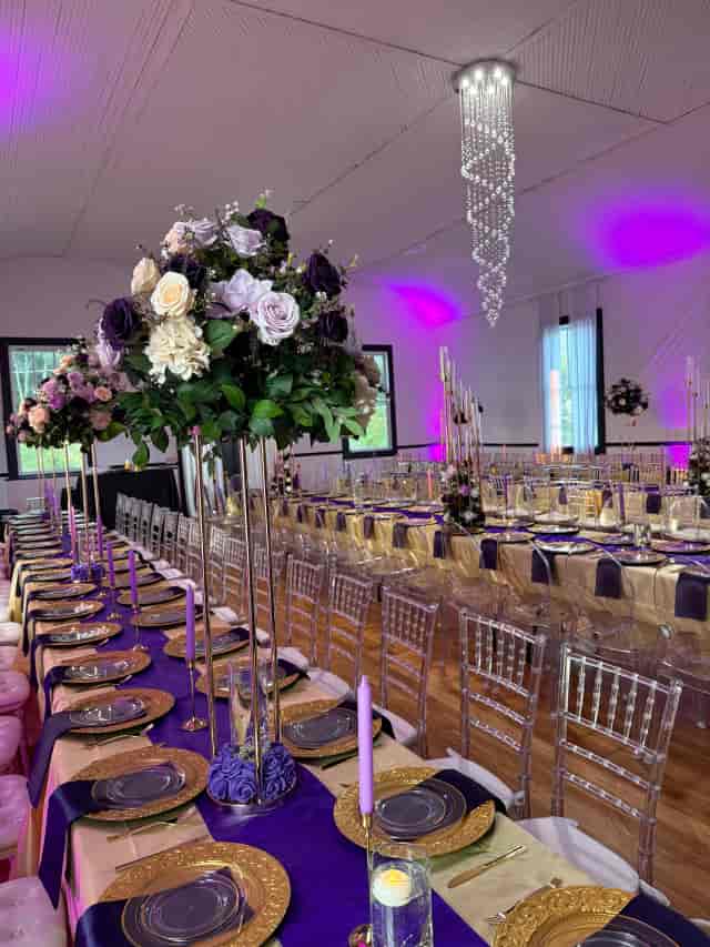 Tablescape with tall floral pedestals at The Sinclair banquet event venue.