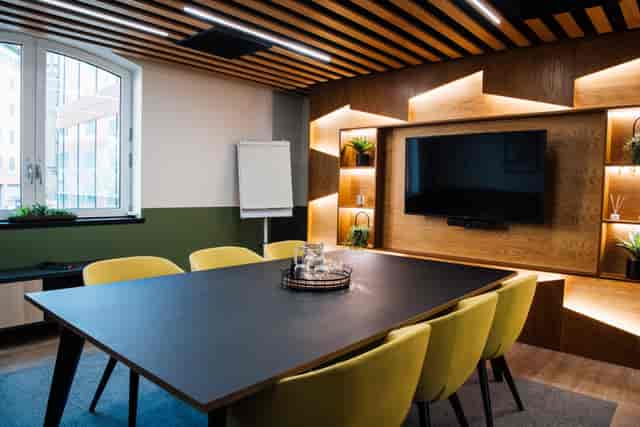 Modern boardroom at Wizu Workspace One Embankment, featuring minimalist executive meeting space.