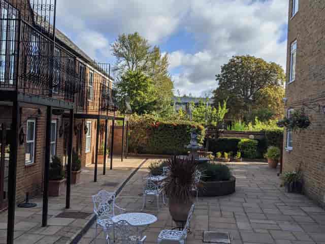 Norham Suite courtyard at Cotswold Lodge Hotel, ideal for outdoor business meetings and events.