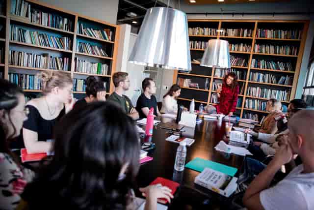 Boardroom-style breakout session in Swire Seminar Room, University College Oxford for event planning.