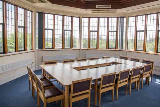 Wolfson Hall boardroom with U-shape seating, ideal for corporate meetings and collaborative workshops.