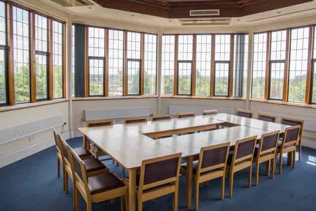 U-shape boardroom at Wolfson Hall, bright meeting space for corporate events and workshops.