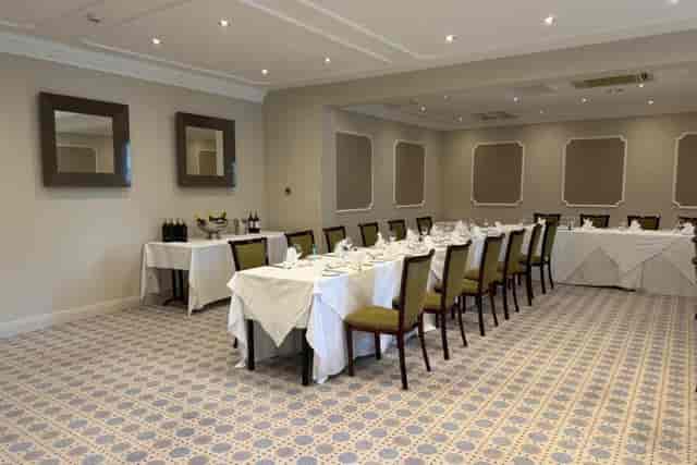 Restaurant 66A at Cotswold Lodge: U-shape corporate dinner or boardroom meeting setup.