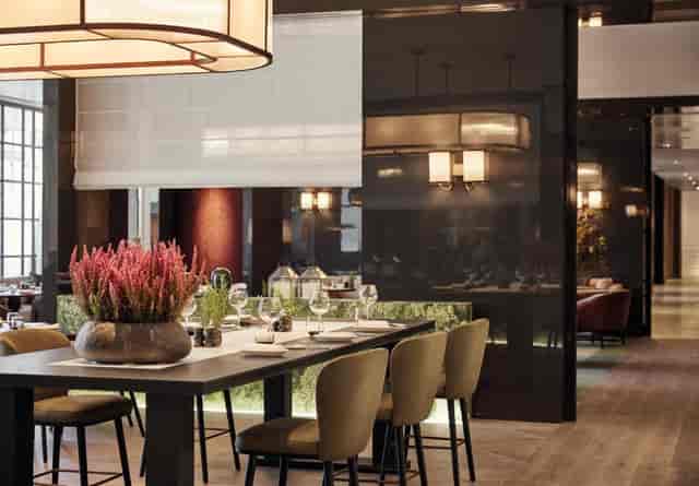 Sophisticated Hotel Villamadrid terrace for corporate dinners and professional board meetings.