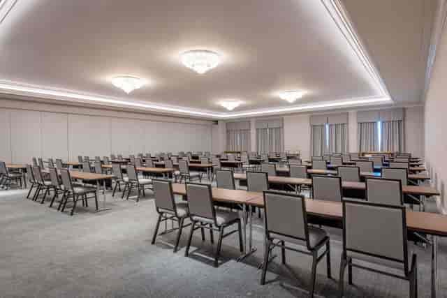 Classroom-style event space at Hotel Liabeny with high ceilings for training seminars and workshops.