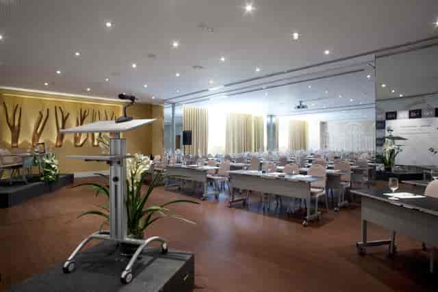 Atocha Room classroom setup with natural light for corporate training and professional seminars.