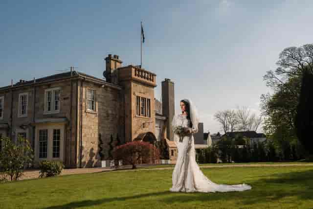 Jasmine Suite at Dalmeny Park House: historic architecture for luxury outdoor wedding events.