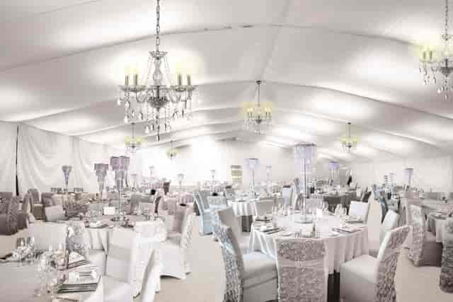 Connemara Suite marquee wedding venue with crystal chandeliers for luxury event hire.