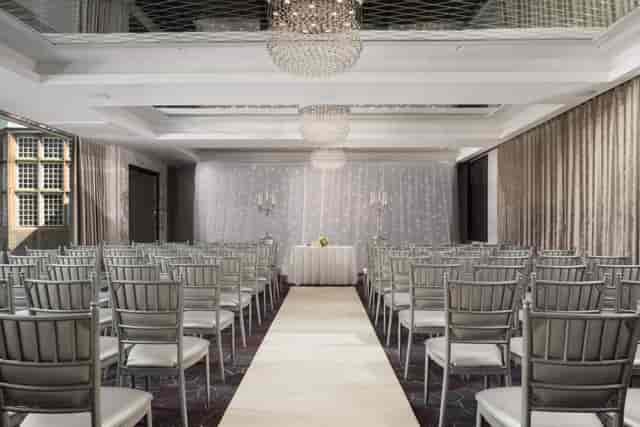Jasmine Suite wedding ceremony setup with elegant chandeliers at Dalmeny Park House Hotel.
