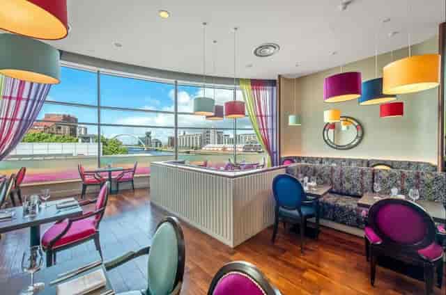 Alea Glasgow event suite with floor-to-ceiling windows for creative workshops and networking.