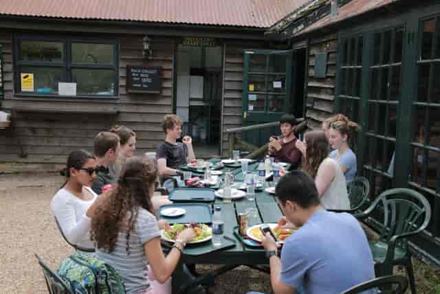 Rustic outdoor networking event with tray-service catering at The Rupert Room.