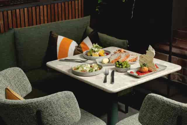 Intimate breakout setup at The Rupert Brooke with gourmet catering for networking events.